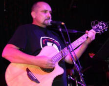 Andrew - acoustic & electric guitar, singer  Photo: Sue Williams